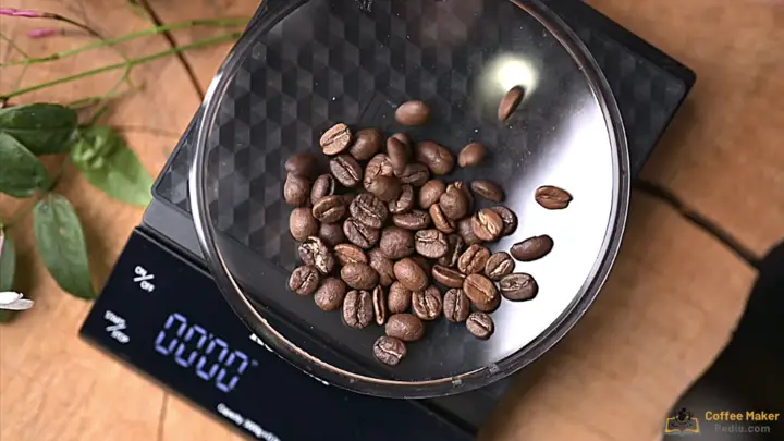 Weigh the coffee beans on a balance scale