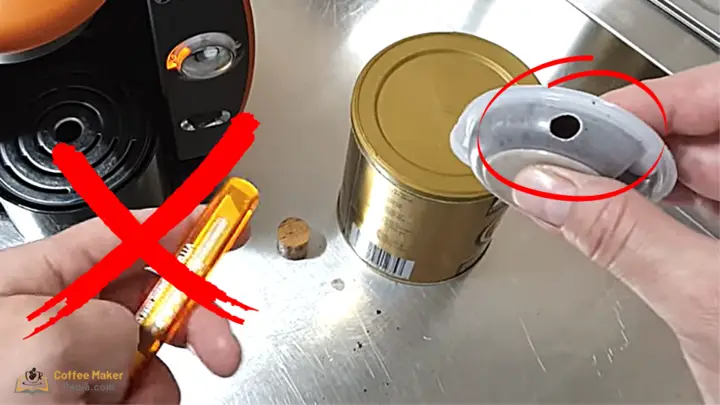 Opening a hole in an original Tassimo pod